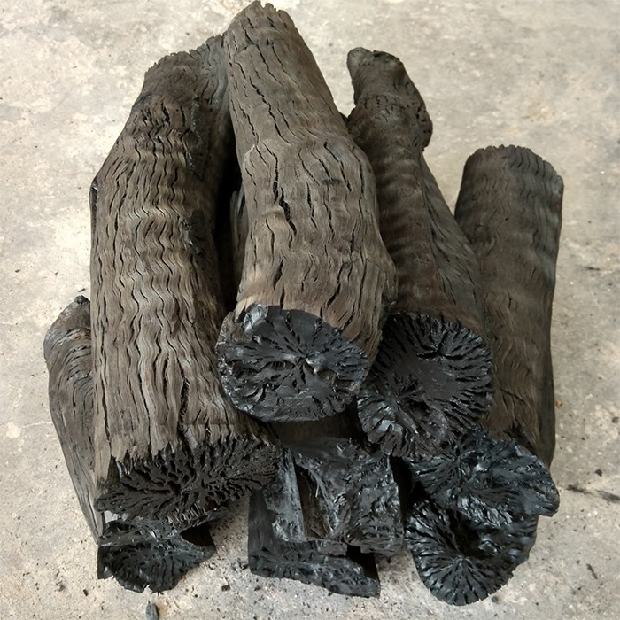 Bag of natural lump hardwood charcoal for grilling